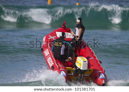 MOLLYMOOK, NSW, AUSTRALIA - APRIL 28 -  Catherine hill bay Surf Life Saving Club competing at Round One of the NSW IRB Premiership at Mollymook Beach on the 28th of April 2012.