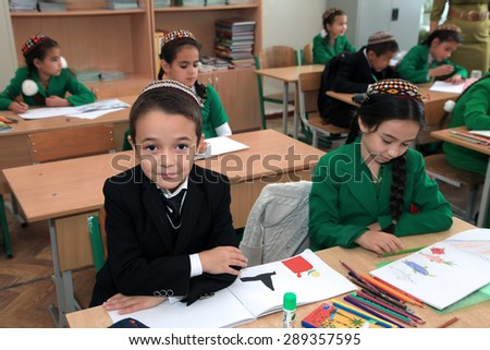 Ashgabad, Turkmenistan - November 4, 2014. Group of students in lesson in the classroom . November 4, 2014.  In schools of Turkmenistan annually trains about 900 thousand children.
