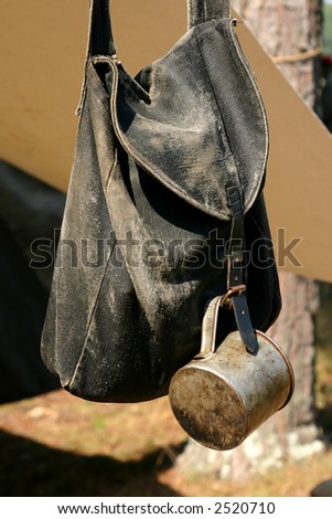 American Civil War campsite Reenactment with knapsack and cup. - stock