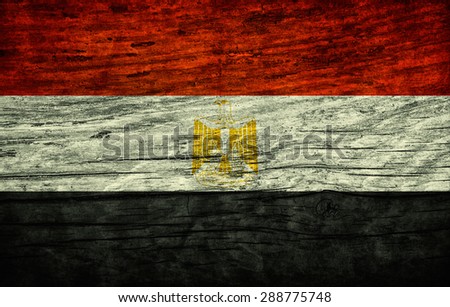 National vintage flag of Egypt on wooden surface