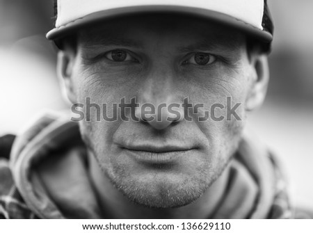 man in a trucker cap