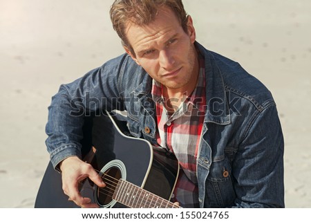 guitarist, acoustic, folk, blues and rock-and-roll