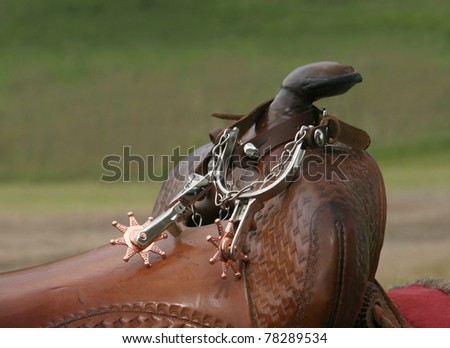 Western saddle and spurs