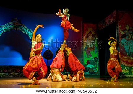 BHUBANESWAR, INDIA - NOVEMBER 24: An unidentified group of male dancers wear traditional ladies costume and perform Gotipua dance at Rabindra Mandap on November 24, 2011 in Bhubaneswar, India