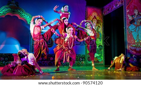 BHUBANESWAR, INDIA - NOVEMBER 24: An unidentified group of Male dancers wears traditional Ladies costume and performs Gotipua dance at Rabindra Mandap on November 24, 2011 in Bhubaneswar, India