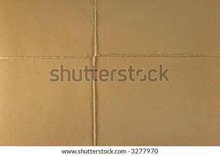 Brown parcel and string background, space for copy.