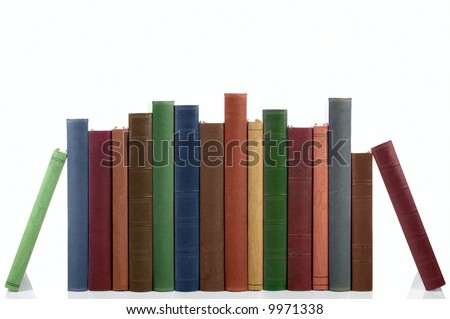 Old books in a row all hardbacks some with leather covers Isolated on white with slight shadow Old books in a row all hardbacks some with leather covers Isolated on white with slight shadow