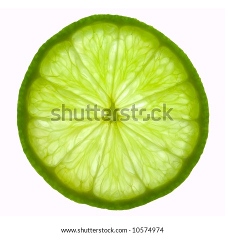 stock photo : Slice of lime, backlit and isolated on white. stock photo : Slice of lime, backlit and isolated on white.
