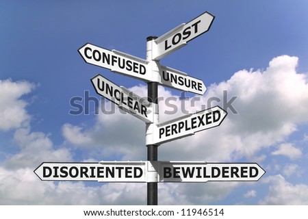 Concept image of a lost and confused signpost against a blue cloudy sky.