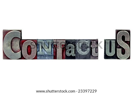The words Contact Us in old letterpress printing blocks isolated on a white background.