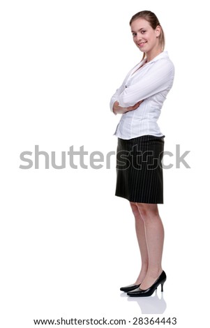Young blonde businesswoman wearing a pinstriped skirt and white blouse, arms folded. Isolated on white background.