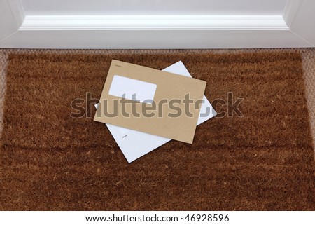Two envelopes on a doormat, blank window to add your own name and address details.