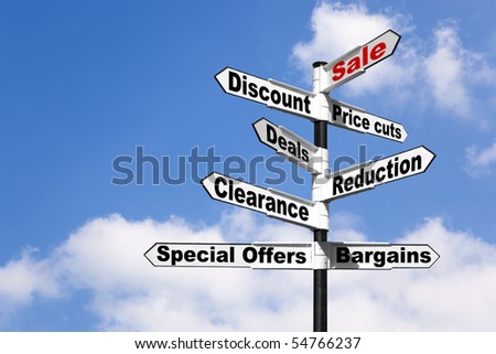 Black and white signpost with the words Sale, Discount, Price cuts, Deals, Reduction, Clearance, Special offers and Bargains against a blue cloudy sky. Good image for retail themes.