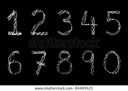 Handwritten numbers written on a blackboard in white chalk then cleaned up during editing and placed on a black background.
