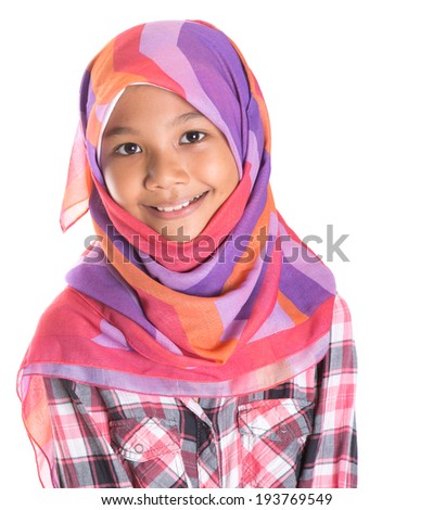 Young Asian Muslim girl with head scarf and shirt over white background