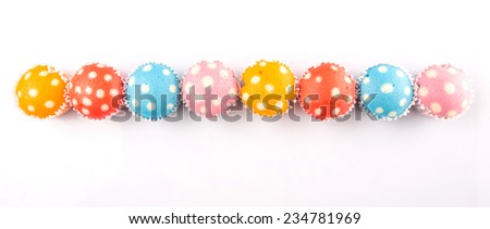 Malaysian colorful steamed rice polka dot muffin or apam polka dot on white background