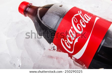 KUALA LUMPUR, MALAYSIA - FEBRUARY 5TH, 2015. A bottle of Coca Cola soft drinks. Coca Cola drinks are produced and manufactured by The Coca-Cola Company, an American multinational beverage corporation