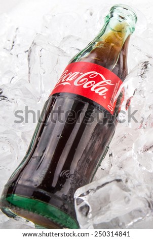 KUALA LUMPUR, MALAYSIA - FEBRUARY 5TH, 2015. Coca Cola soft drink on ice. Coca Cola drinks are produced and manufactured by The Coca-Cola Company, an American multinational beverage corporation