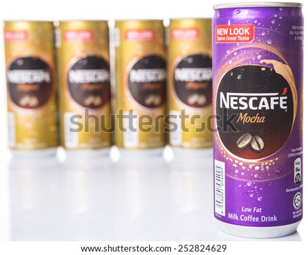 KUALA LUMPUR, MALAYSIA - FEBRUARY 13TH 2015. Nescafe can drinks. Nescafe is an instant coffee brand made by Nestle, a Swiss multinational food and beverage company, first introduced on April 1, 1938.
