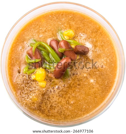 Cendol, a popular traditional dessert originating from Southeast Asia in a glass over white background.