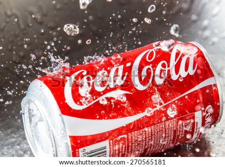 KUALA LUMPUR, MALAYSIA - JANUARY 31ST, 2015. Water droplets on Coca Cola can. Coca Cola drinks are produced and manufactured by The Coca-Cola Company, an American multinational beverage corporation.