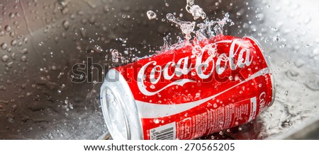 KUALA LUMPUR, MALAYSIA - JANUARY 31ST, 2015. Water droplets on Coca Cola can. Coca Cola drinks are produced and manufactured by The Coca-Cola Company, an American multinational beverage corporation.