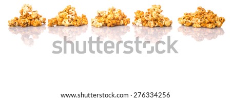 Caramel popcorn over white background