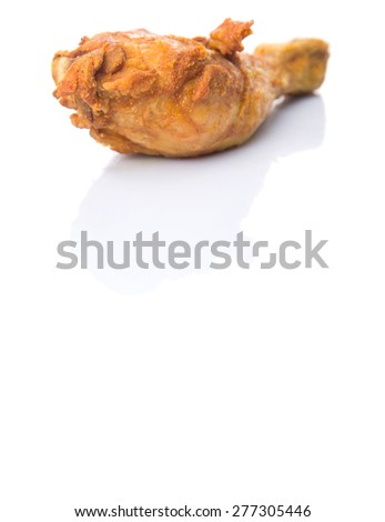 Deep fried chicken drumsticks over white background