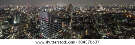 TOKYO, JAPAN - AUGUST 8TH, 2014: View of Tokyo metropolis at night . Tokyo is one of the 47 prefecture of Japan and is the capital of Japan. it is also Japan\'s largest city.