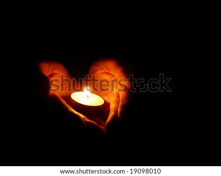 Hand Holding Candle