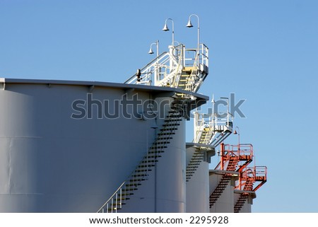 Tank farm for petroleum products in Tucson Arizona showing tanks access stairs articulated stars