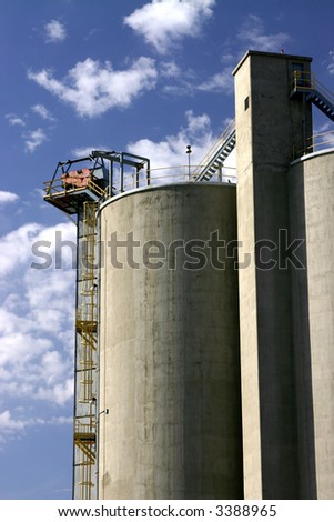 Concrete silo at concrete plant in Utah with blue sky background