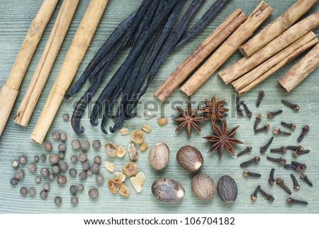 spices for desserts and cookies, cakes, biscuits, wooden table background, top view