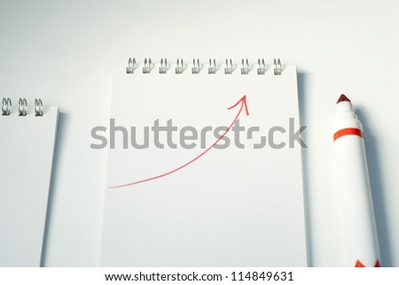 note book with growing graph