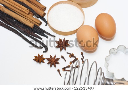 gingerbread cookie ingredients on white kitchen table