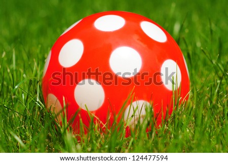 red ball with speckles