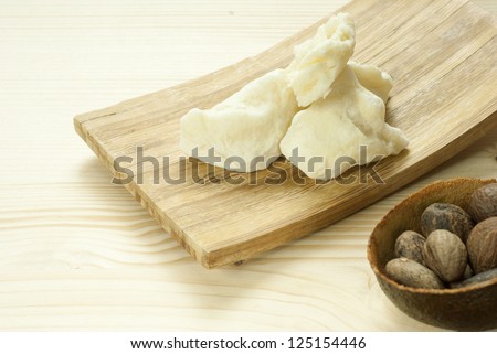 spa setting with shea butter nuts and shea butter