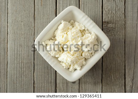curd cheese, rustic wooden table background
