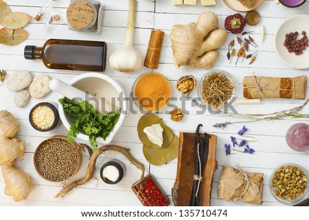 Herbs And Spices On White Wood Table