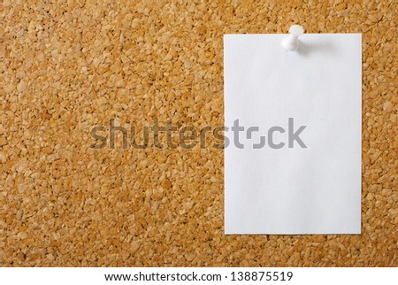 empty post its with pins on memo board