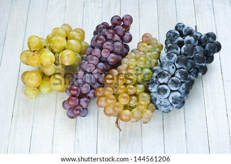 autumn fruit still life, bright wooden table background