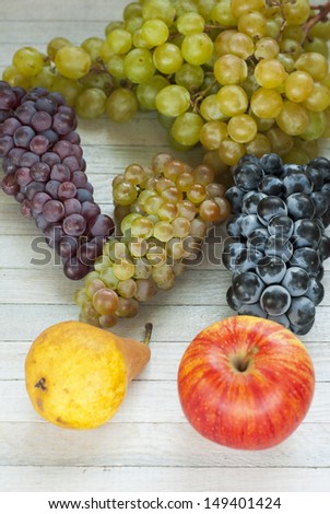 autumn fruit still life, bright wooden table background
