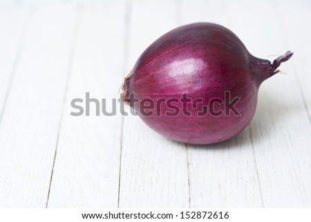spanish onion on wooden
