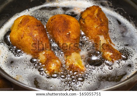country fried chicken in hot oil
