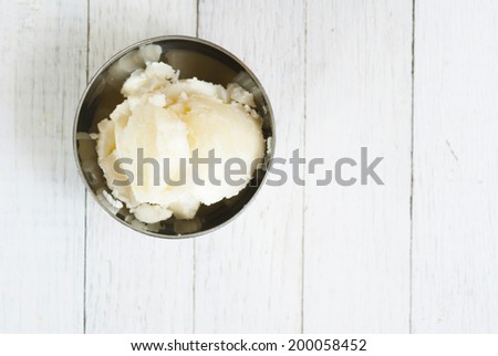 shea butter on white wooden