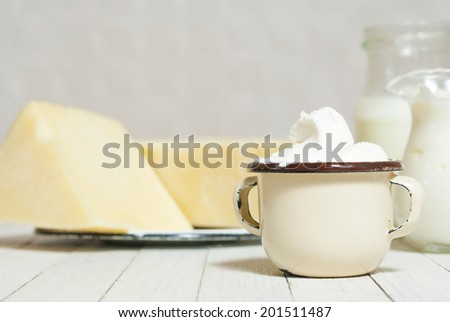dairy products on white wooden table