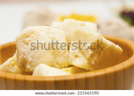 shea butter in bamboo bowl
