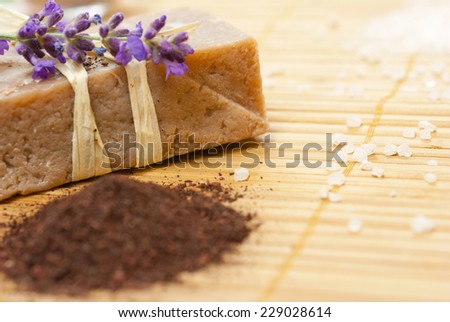 organic soaps with purple flowers on bamboo