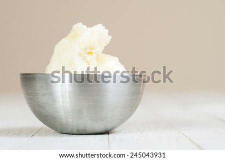 shea butter on white wooden