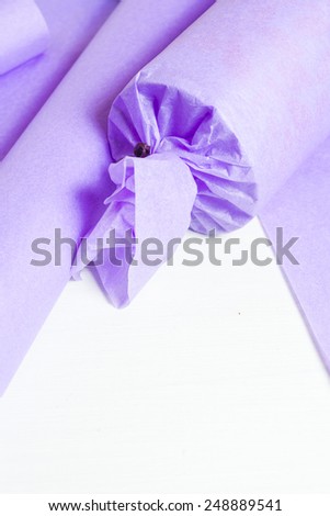 gift packaging with purple papers